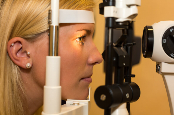 woman having an eye examination for photophobia